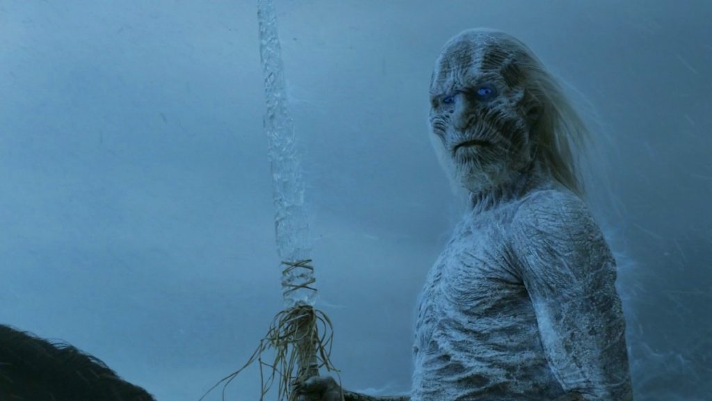 A shirtless White Walker holding an ice spear on a horse on Game of Thrones